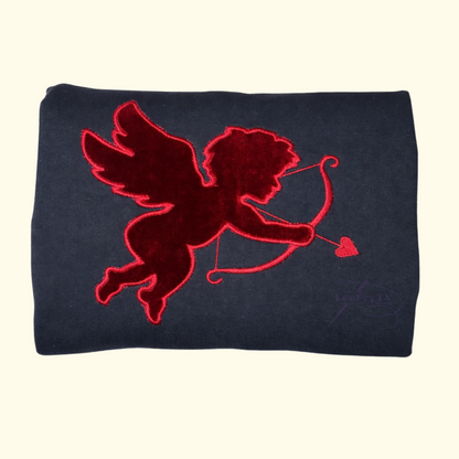 folded black sweatshirt with velvet cupid applique design 