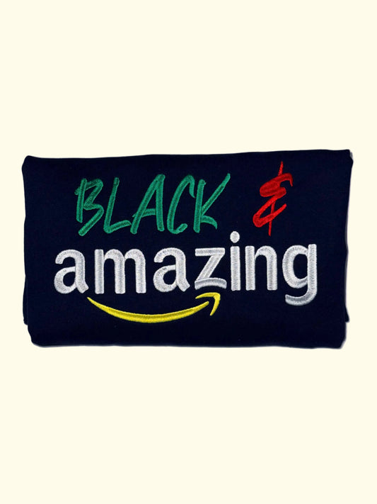 Navy embroidered sweatshirt with 'Black & amazing' text