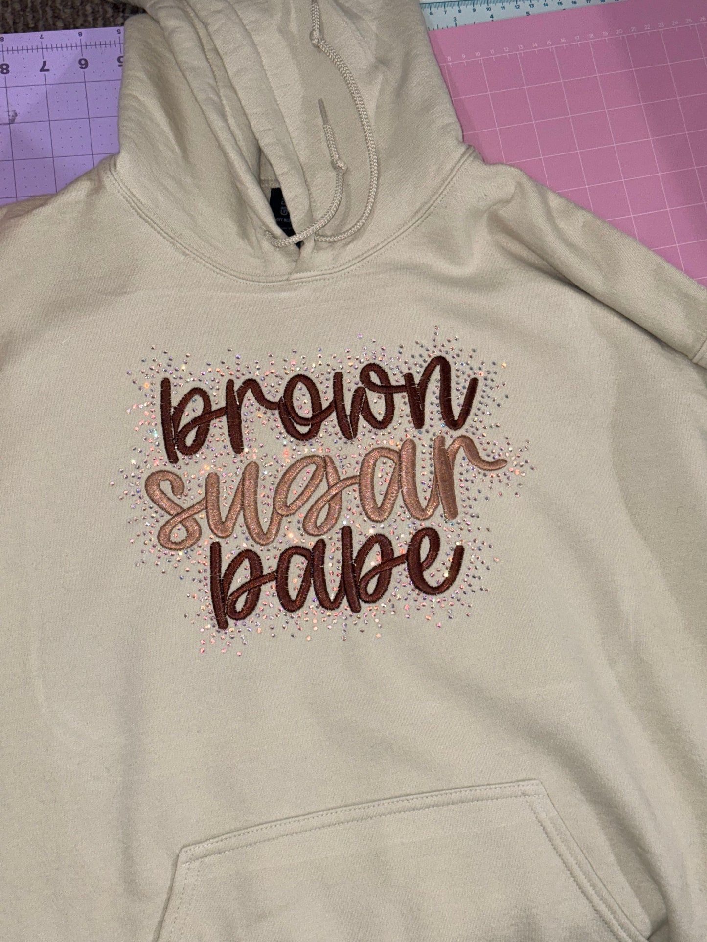 Embroidered sweatshirt with decorative design brown sugar babe with rhinestone detailing
