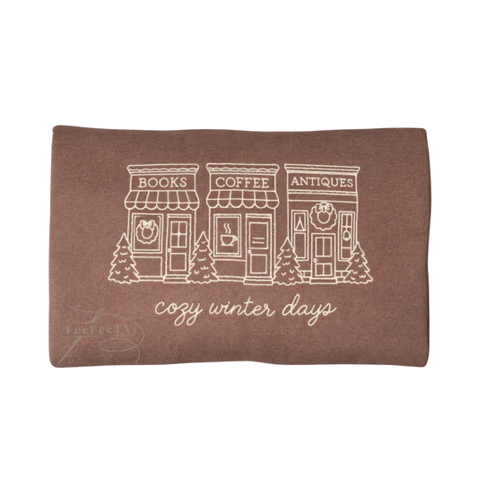 Embroidered brown sweatshirt with text cozy winter days, a book store, Coffee store. Antique store. 