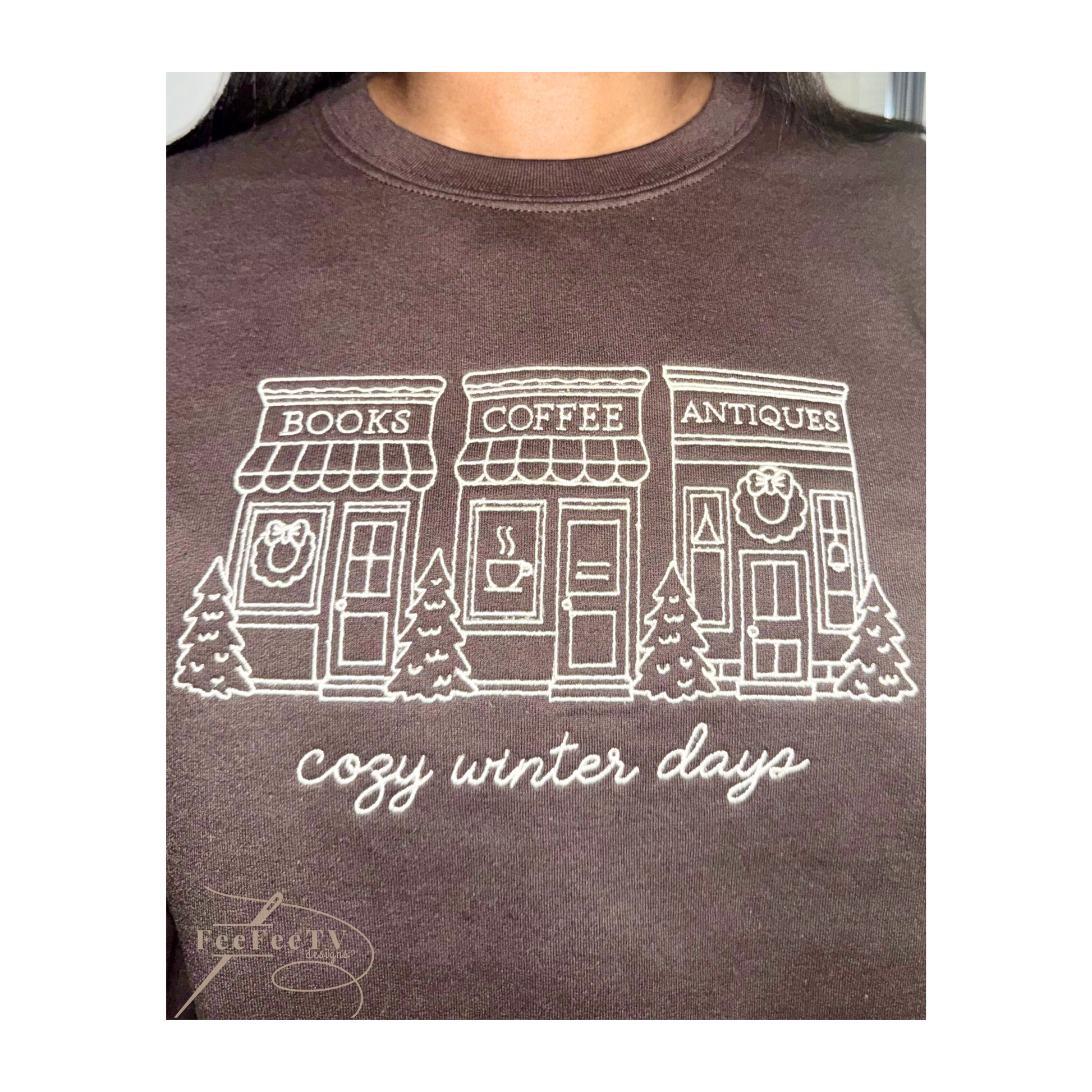 Embroidered brown sweater with text ‘cozy winter days’ a book store, Coffee store, Antique store. 