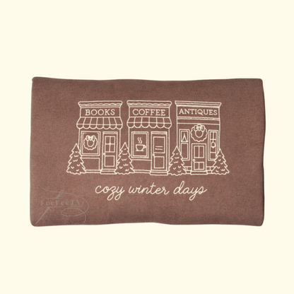 Embroidered brown sweatshirt with text cozy winter days, a book store, Coffee store. Antique store. 