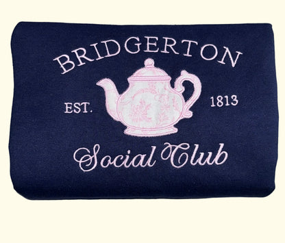 Navy blue sweatshirt regency romance inspired featuring a pink chinoiserie teapot.