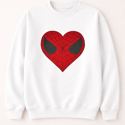 White sweatshirt with a red heart-shaped spider web design on a beige background