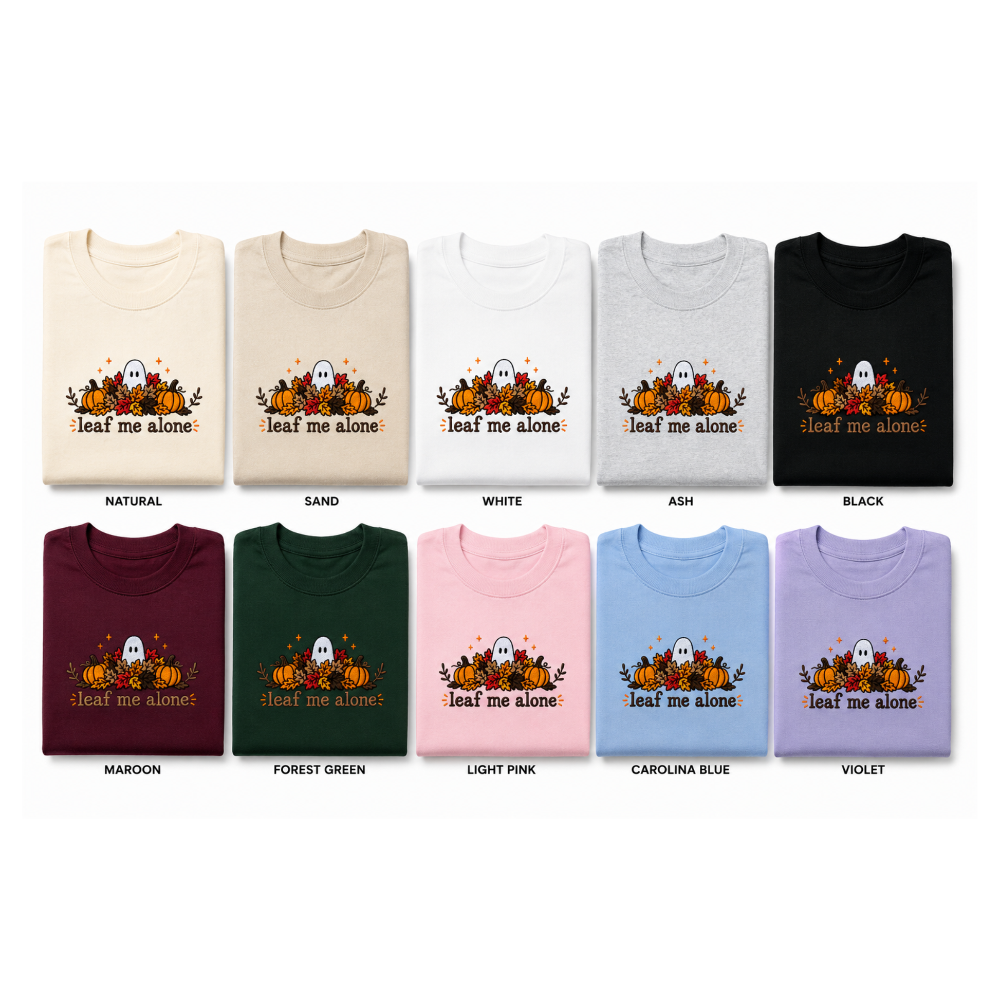A grid of folded T-shirts showing the same embroidery in multiple color options. The image features pumpkins, ghosts, leaves, and the text 'leaf me alone".