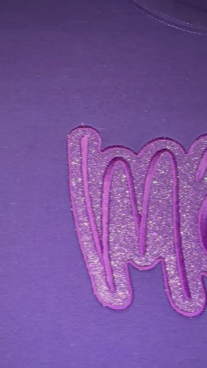 closeup video of embroidered mama and glitter htv sweatshirt